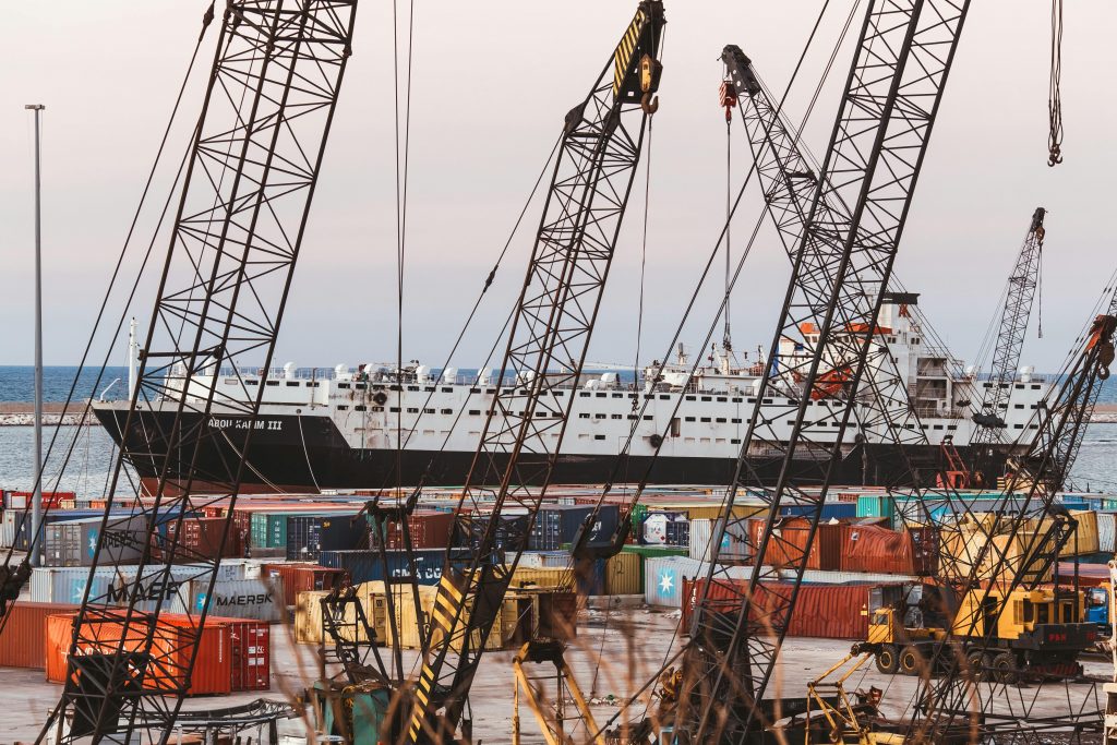 Container port and cranes representing Middle East freight forwarding trade lanes
