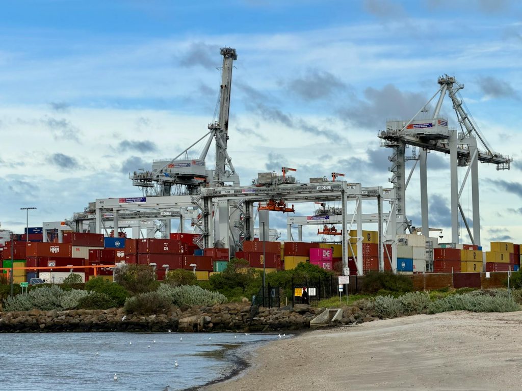 Container terminal at the Port of Melbourne representing Australia and Oceania freight trade lanes