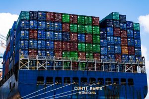 Shipping containers and cargo vessel representing a global freight partner network