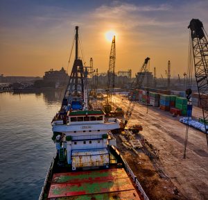 Container port and cargo vessel for an article comparing freight networks across ASEAN, China, and India